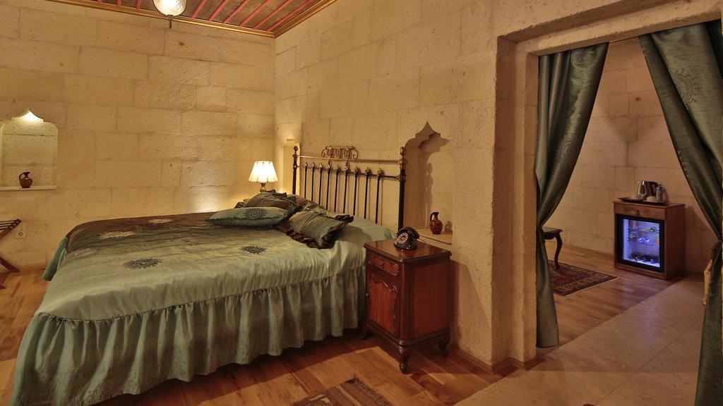 Golden Cave Suites أوروغوبْ الغرفة الصورة